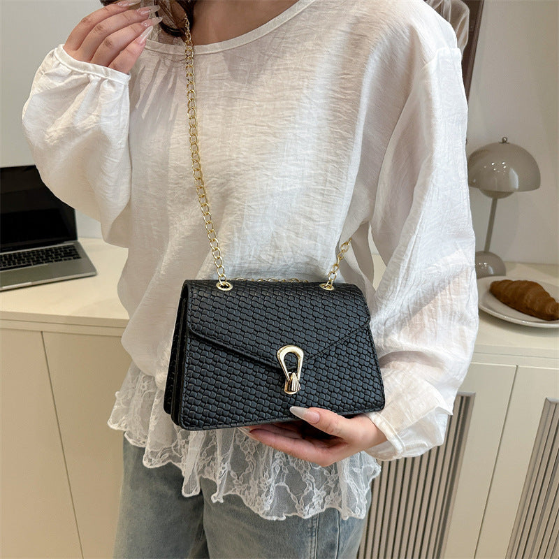 Schultertasche mit eleganter Prägung – modern & stilvoll