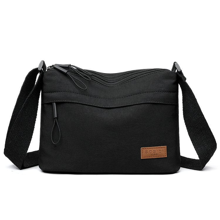 Schultertasche mit wasserabweisendem Stoff – leicht & vielseitig