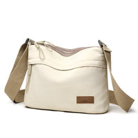 Schultertasche mit wasserabweisendem Stoff – leicht & vielseitig