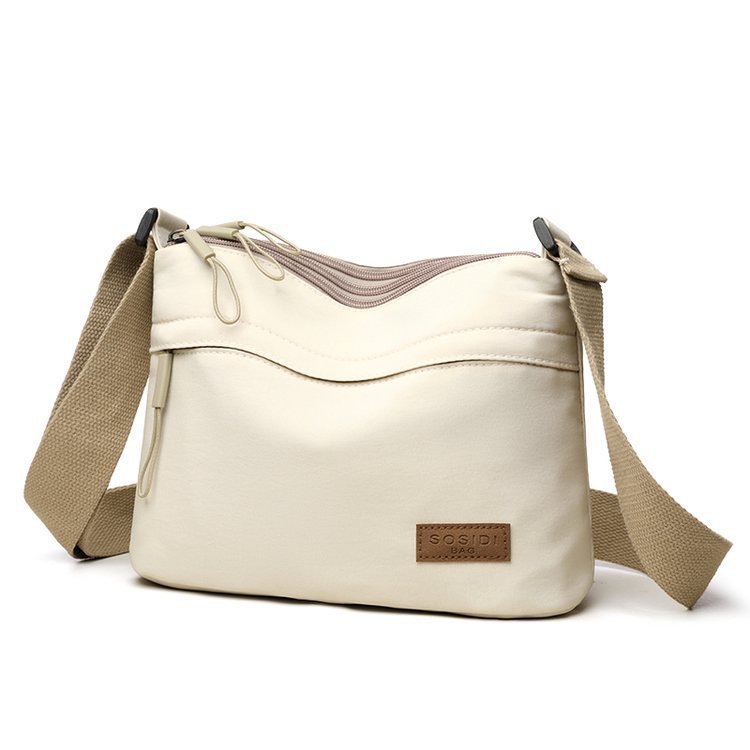 Schultertasche mit wasserabweisendem Stoff – leicht & vielseitig