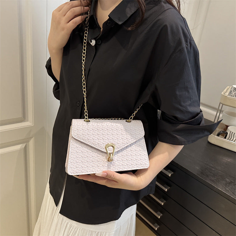 Schultertasche mit eleganter Prägung – modern & stilvoll